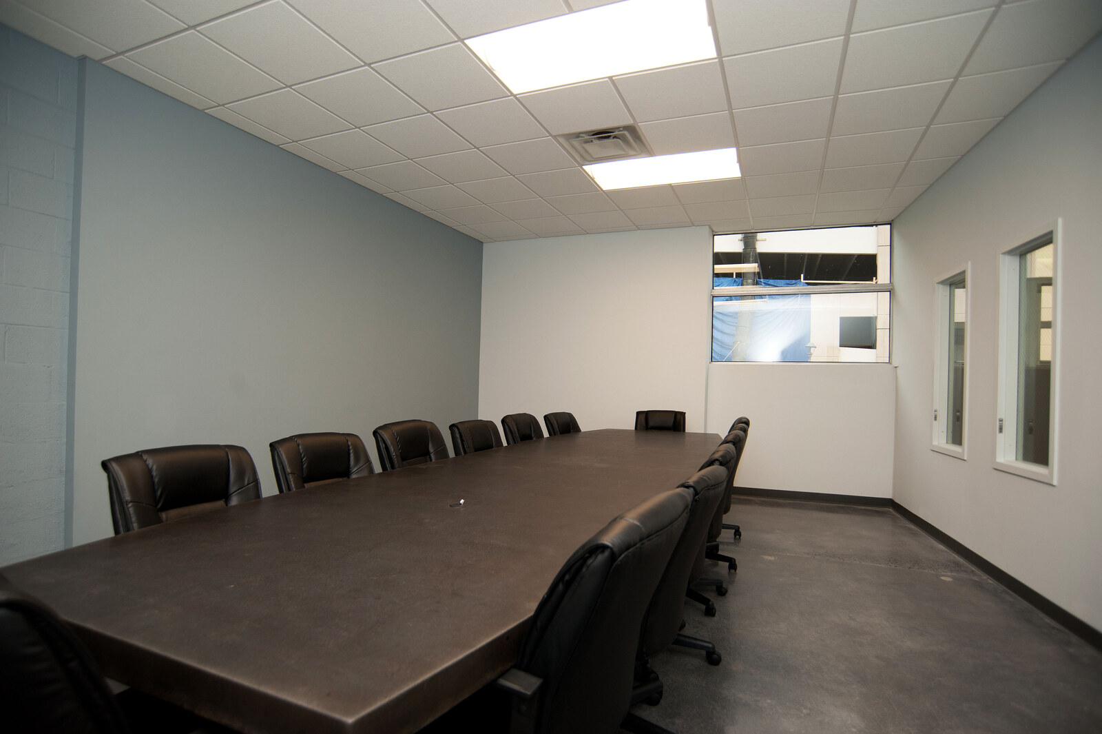 Oversized Conference Table — Oversized seamless concrete table
